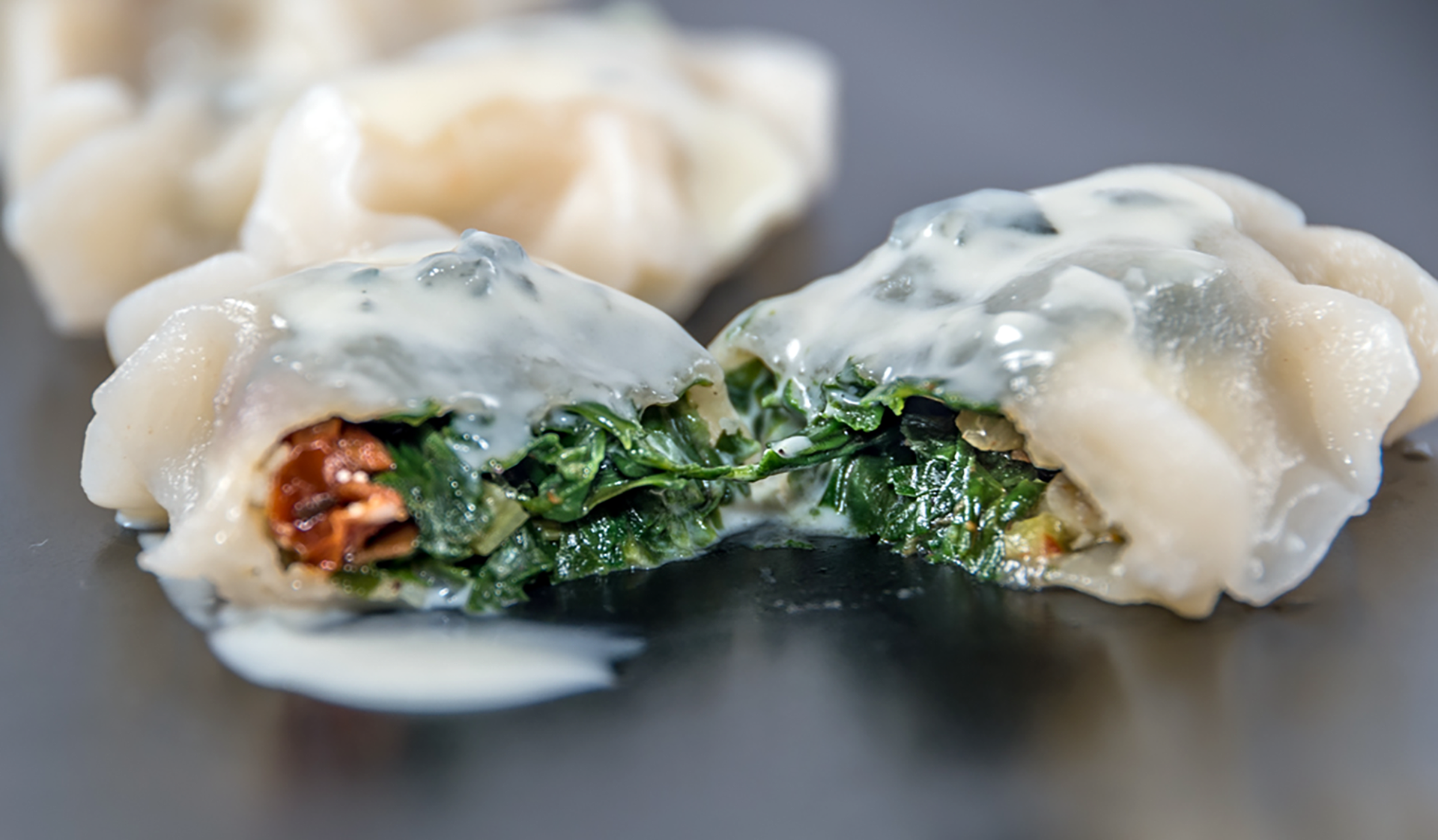 Dumplings with spinach, sun-dried tomatoes and Grikios salad cheese